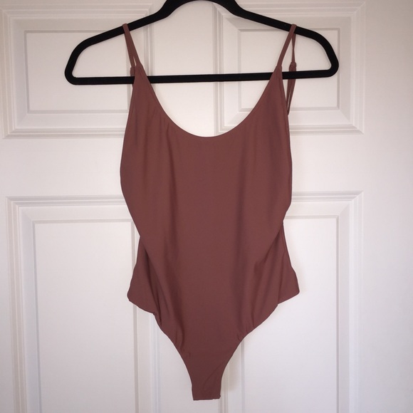 Makers Of Dreams Tops - Makers Of Dreams Pale Pink Bodysuit S